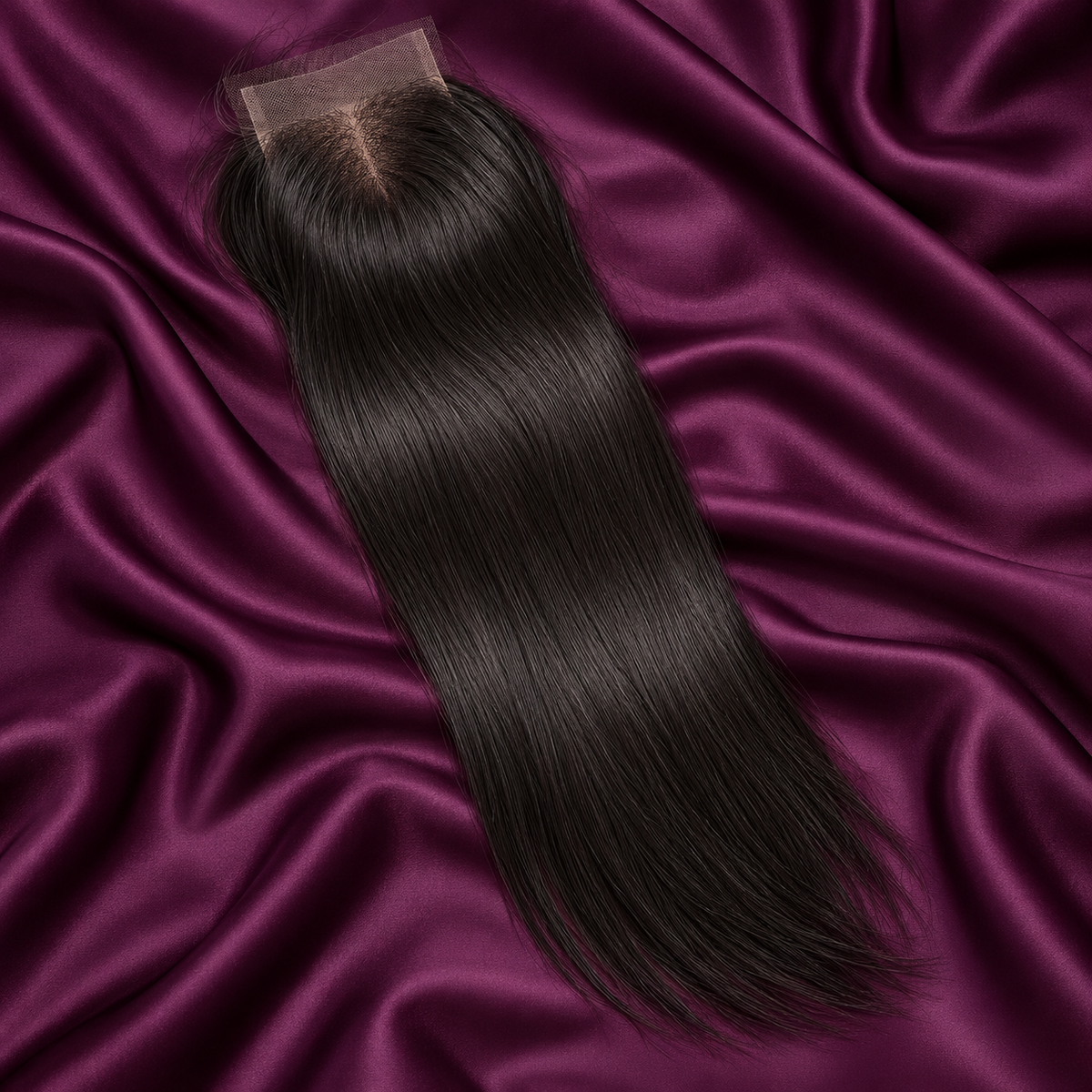 Illustrative natural black lace closure on plum satin