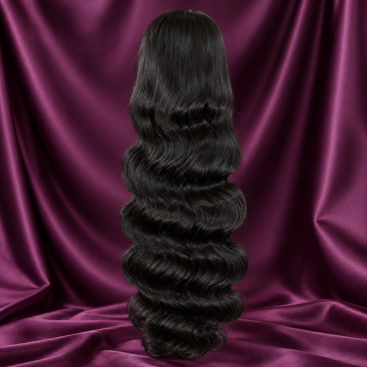 Body Wave black wig texture on plum satin